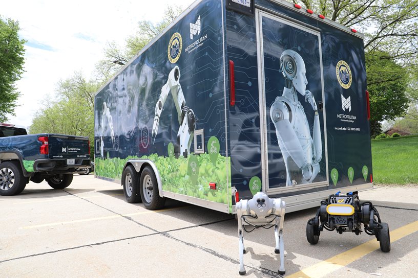 Robotics trailer with robots Gizmo and Diablo staged in front of trailer