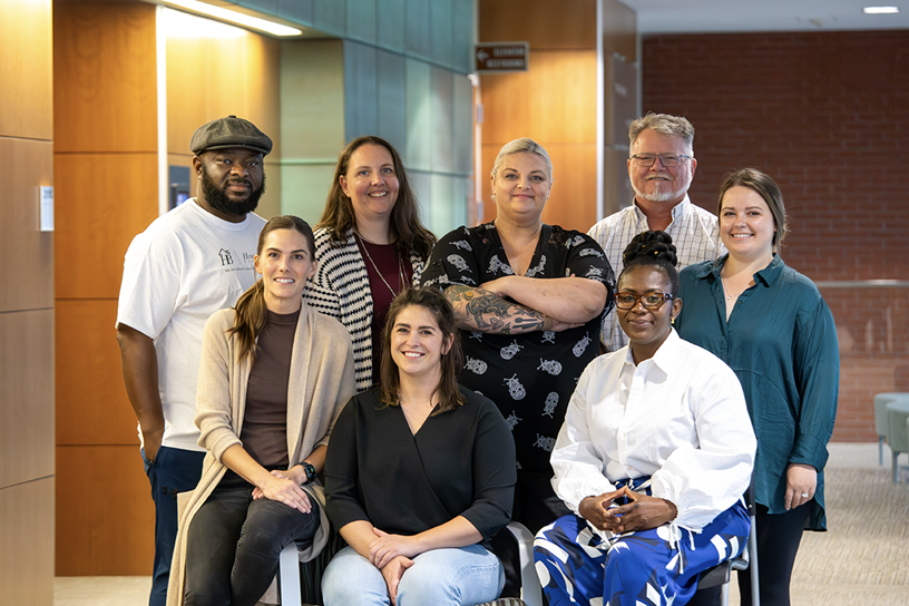 Class 1 of Applied Leadership Academy showing eight people split up into two rows.