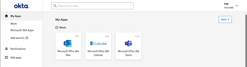 Okta Homepage displaying My Apps. The account login is at the top right corner of the page to the right of the search bar